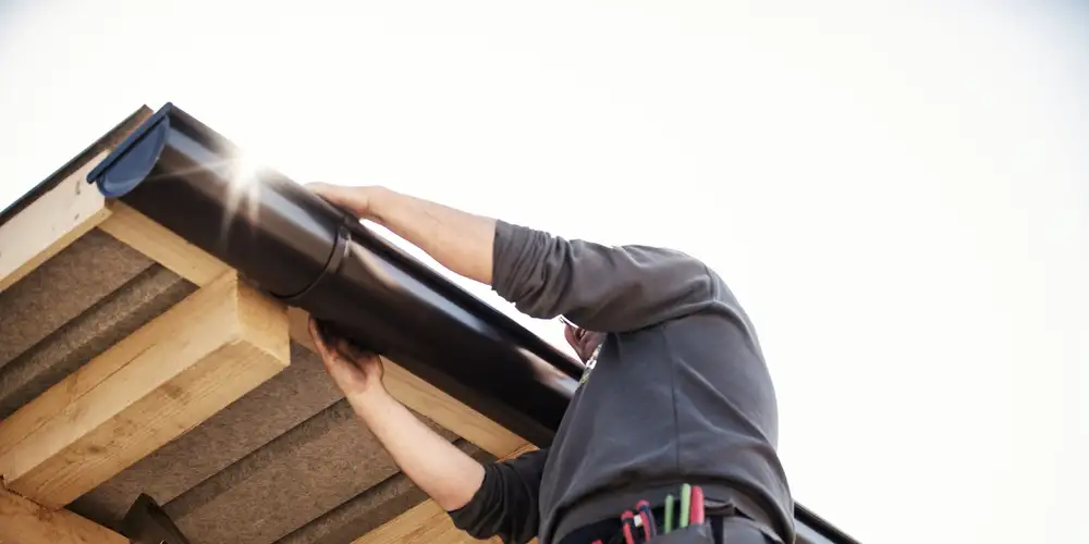 Downspout run installed along a home exterior